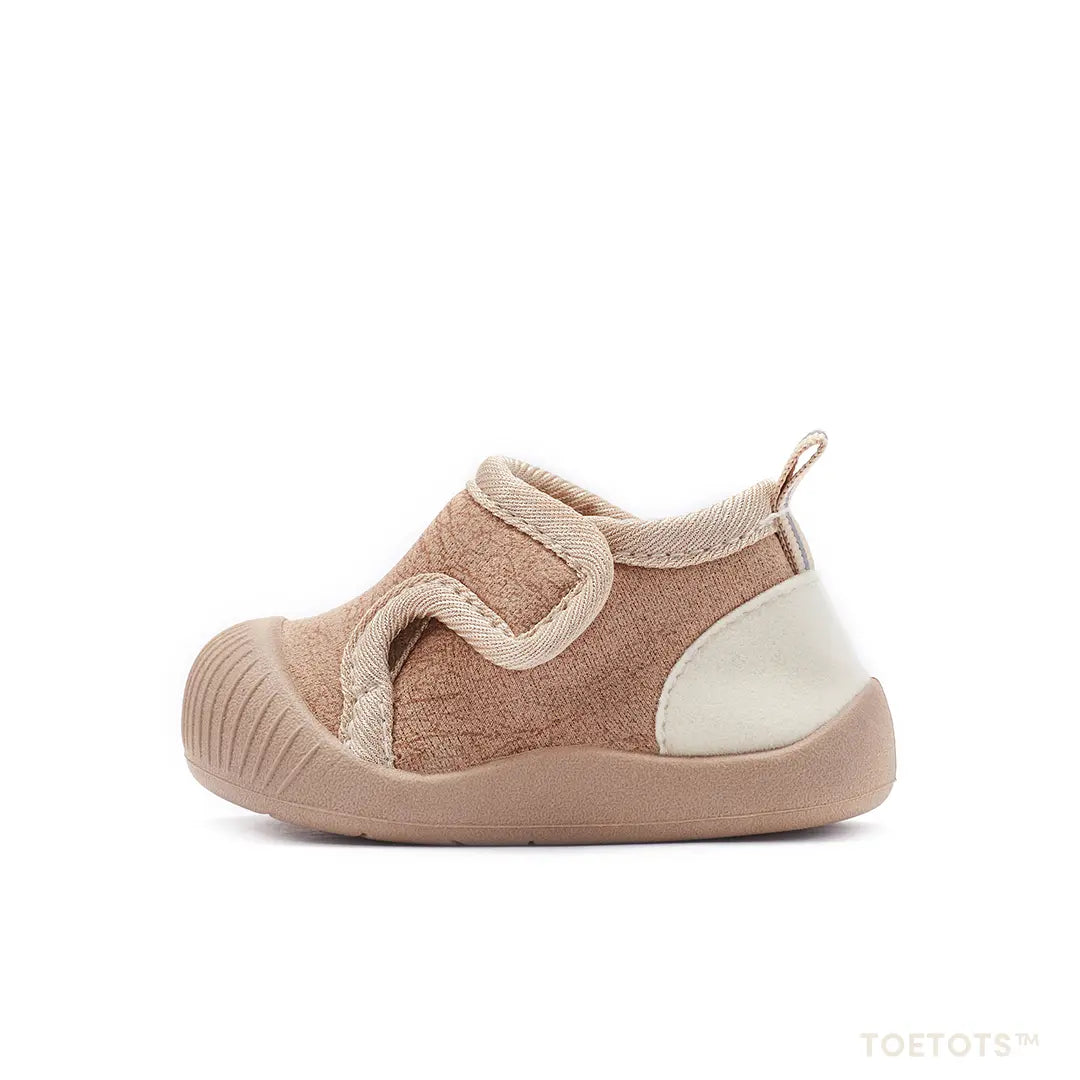 Close up of a flexible soft sole baby shoe