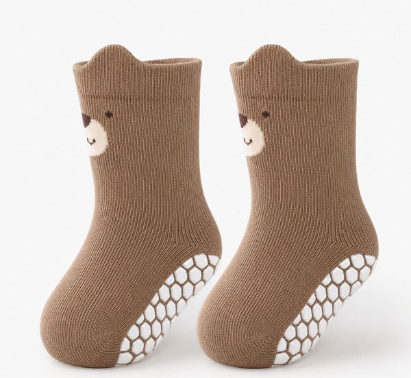 Pair of brown non-slip grip socks for toddlers